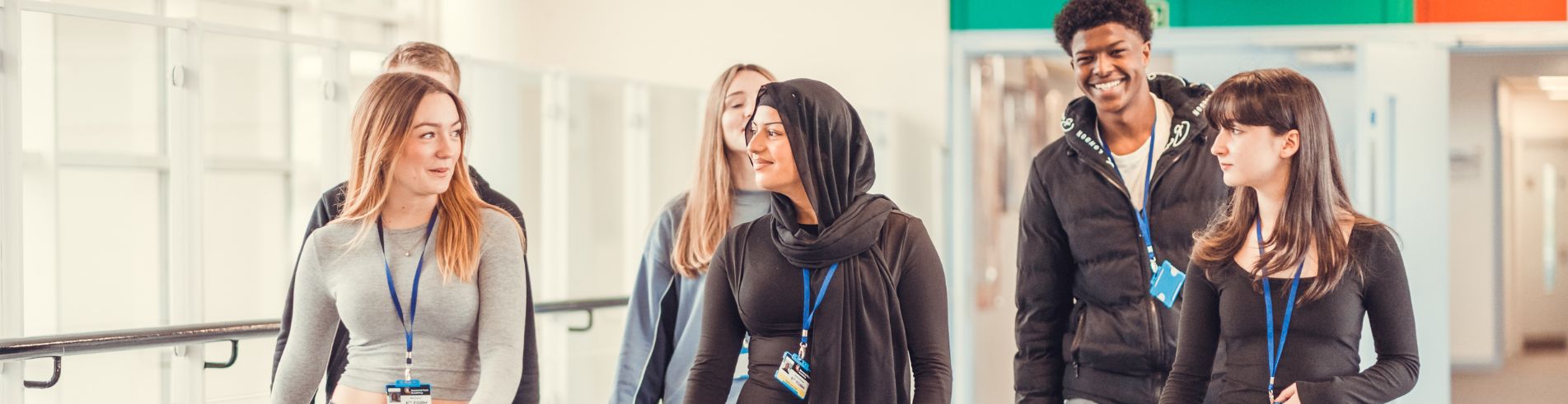 what makes Jesmond Park Academy&#39;s sixth form a great choice - group of students walking down a corridor 